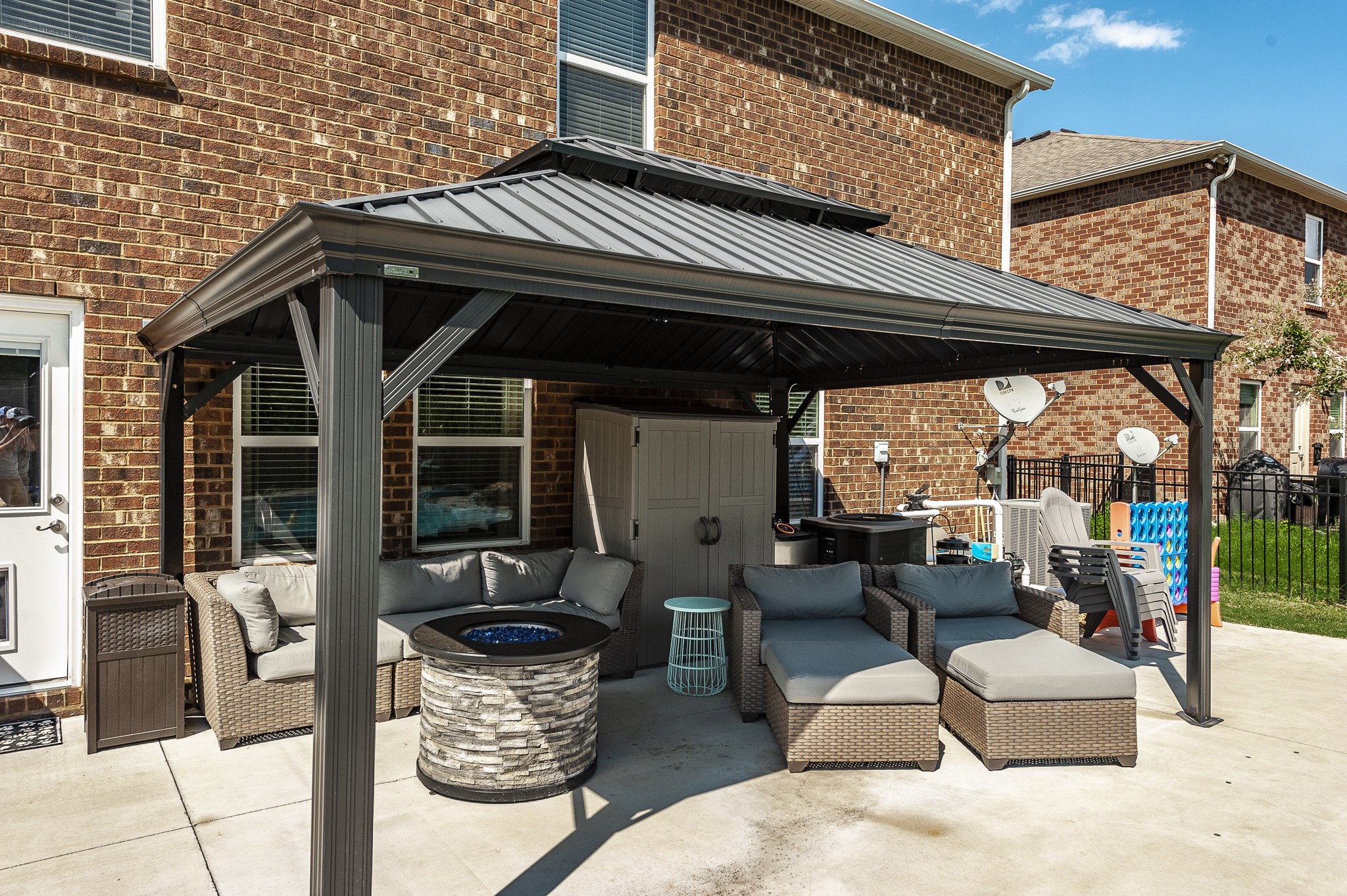 1019 Benwick Road Hendersonville, TN 37075 - Photo 18 of 66 a view of a patio with table and chairs potted plants with wooden roof and floor to ceiling window