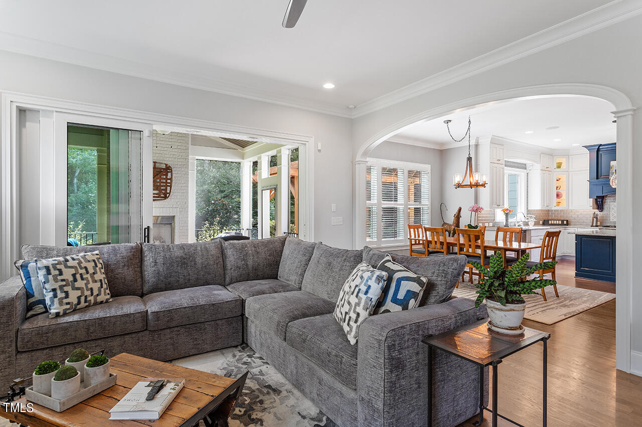 6940 Bartons Bend Way Raleigh, NC 27614 - Photo 15 of 66 a living room with furniture and a large window