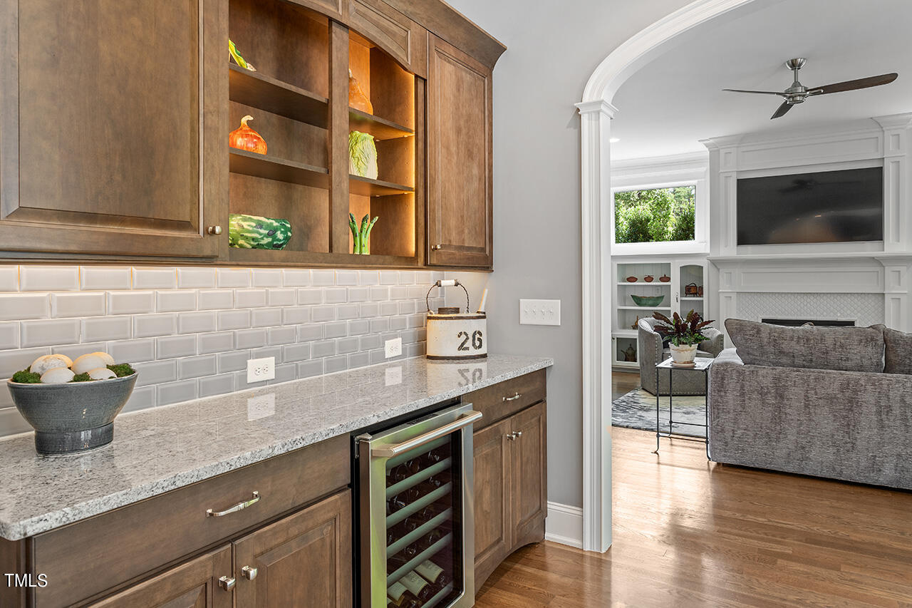6940 Bartons Bend Way Raleigh, NC 27614 - Photo 17 of 66 a kitchen with a sink and a stove top oven