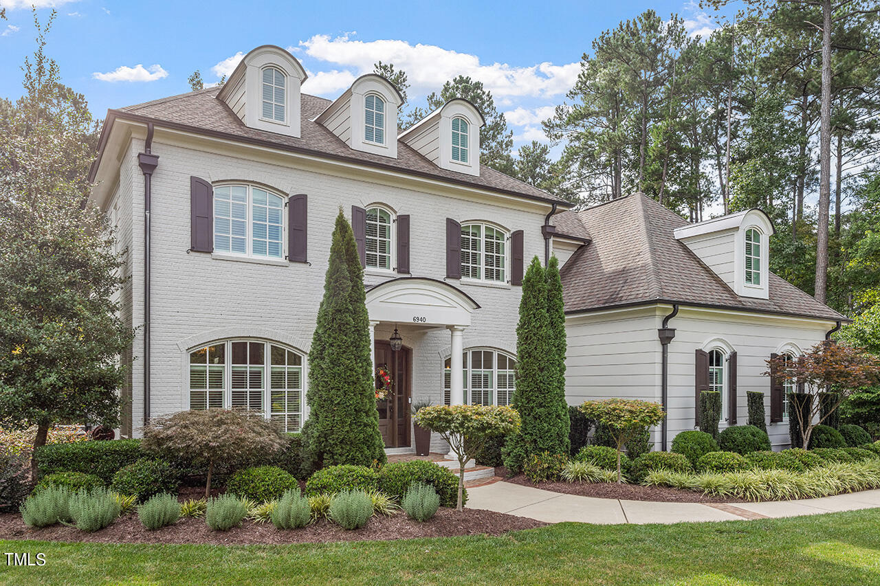 6940 Bartons Bend Way Raleigh, NC 27614 - Photo 2 of 66 front view of a house with a yard