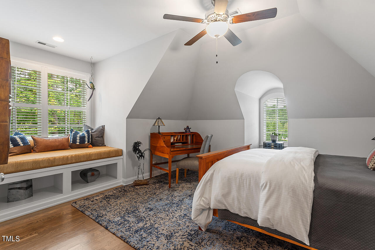 6940 Bartons Bend Way Raleigh, NC 27614 - Photo 37 of 66 a bed room with a bed and a chair