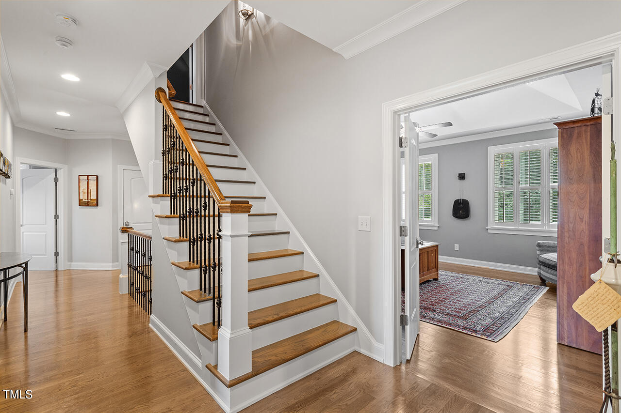 6940 Bartons Bend Way Raleigh, NC 27614 - Photo 41 of 66 a view of entryway and hall with wooden floor