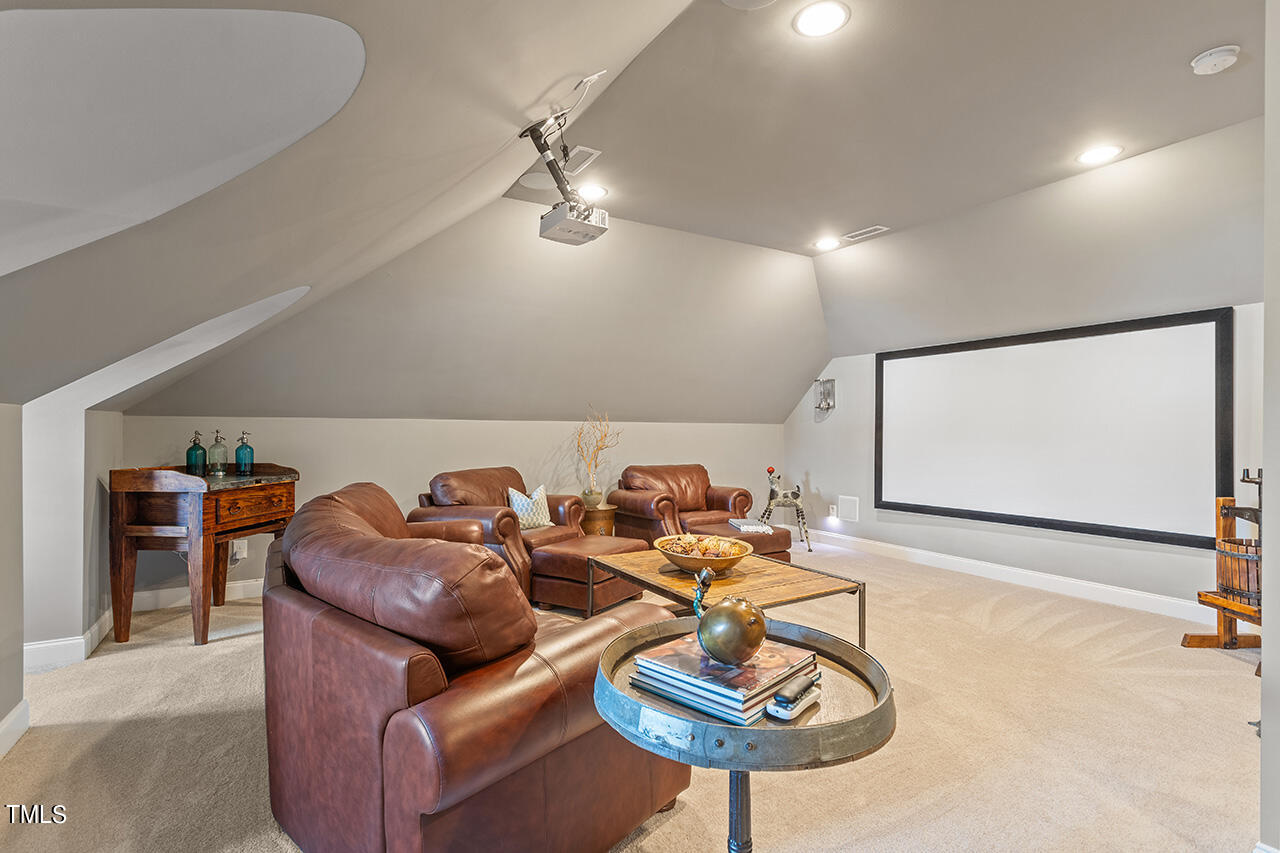 6940 Bartons Bend Way Raleigh, NC 27614 - Photo 43 of 66 a projector room with furniture