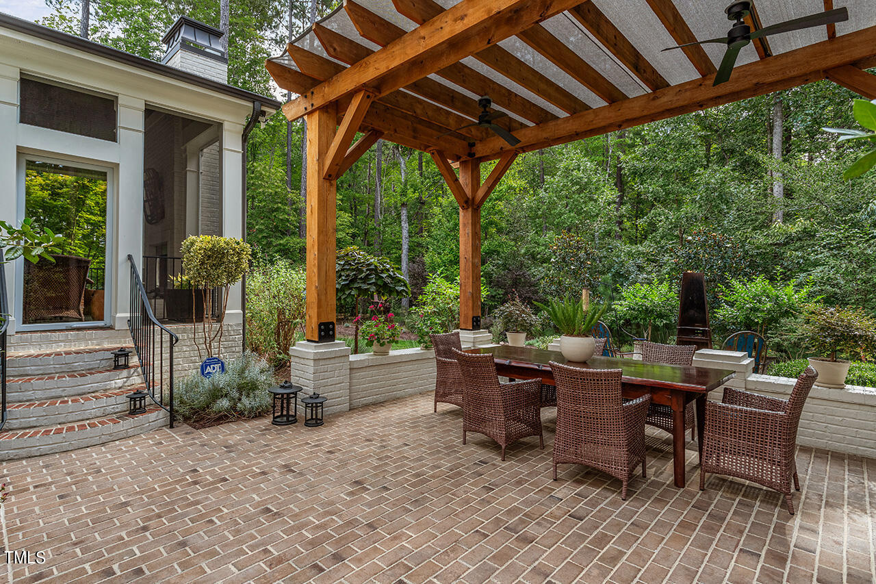 6940 Bartons Bend Way Raleigh, NC 27614 - Photo 50 of 66 a view of a patio filled with furniture
