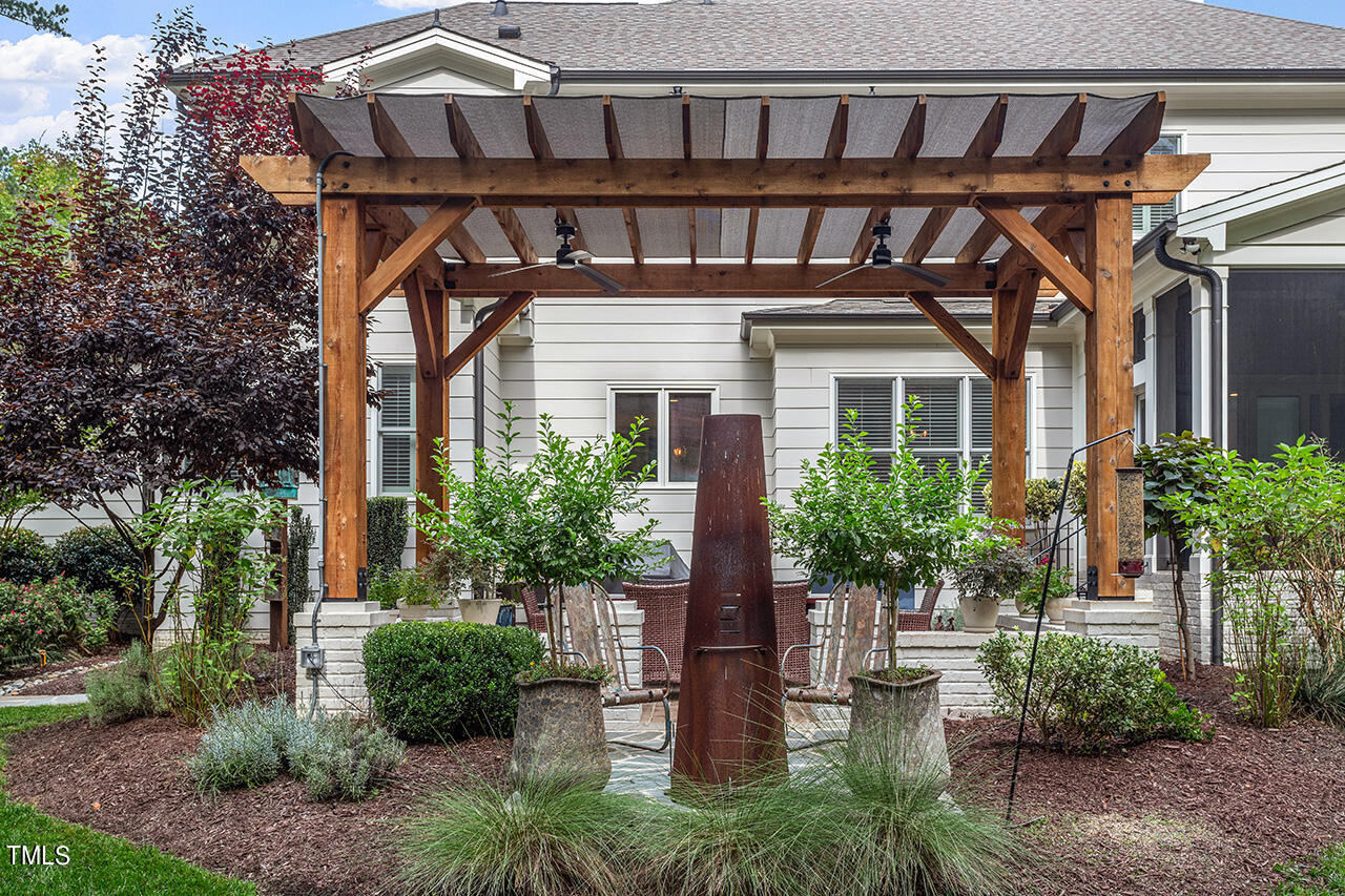 6940 Bartons Bend Way Raleigh, NC 27614 - Photo 51 of 66 a front view of a house with a porch