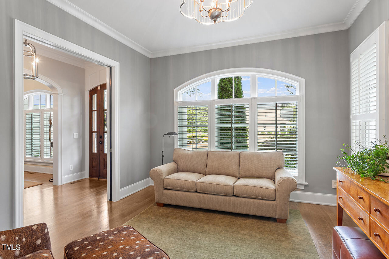 6940 Bartons Bend Way Raleigh, NC 27614 - Photo 6 of 66 a living room with furniture and a large window