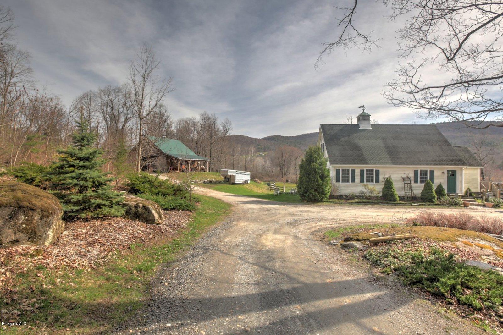 20 Main Road Tyringham, MA 01238 - Photo 1 of 50 a view of a house with a snow in the yard