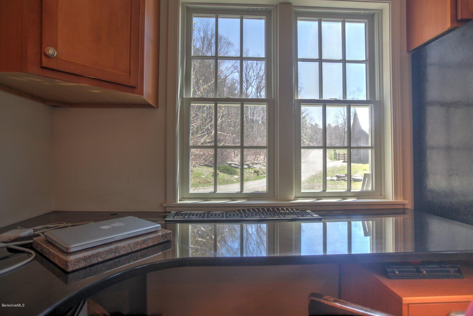 20 Main Road Tyringham, MA 01238 - Photo 22 of 50 a room with workbench and window