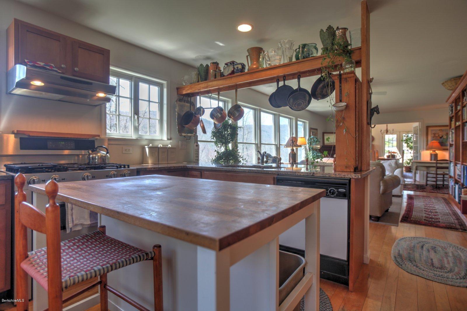 20 Main Road Tyringham, MA 01238 - Photo 23 of 50 a view of kitchen island a sink and living room