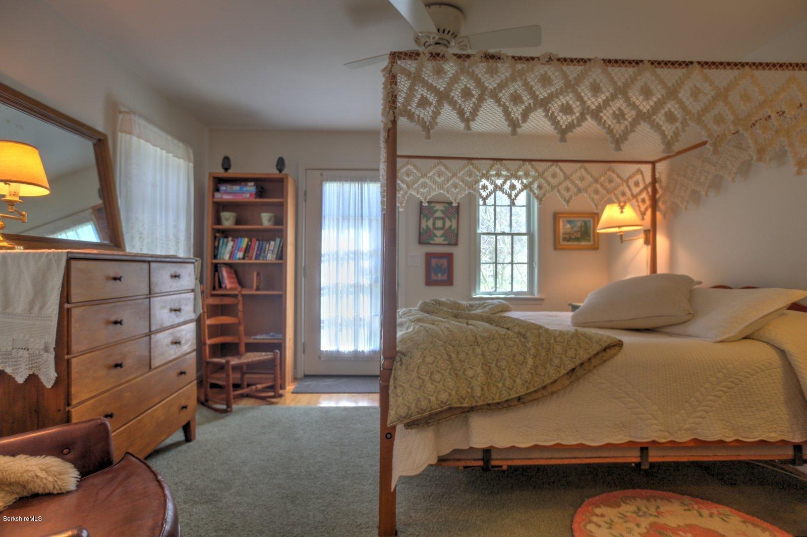20 Main Road Tyringham, MA 01238 - Photo 30 of 50 a bedroom with a bed and window
