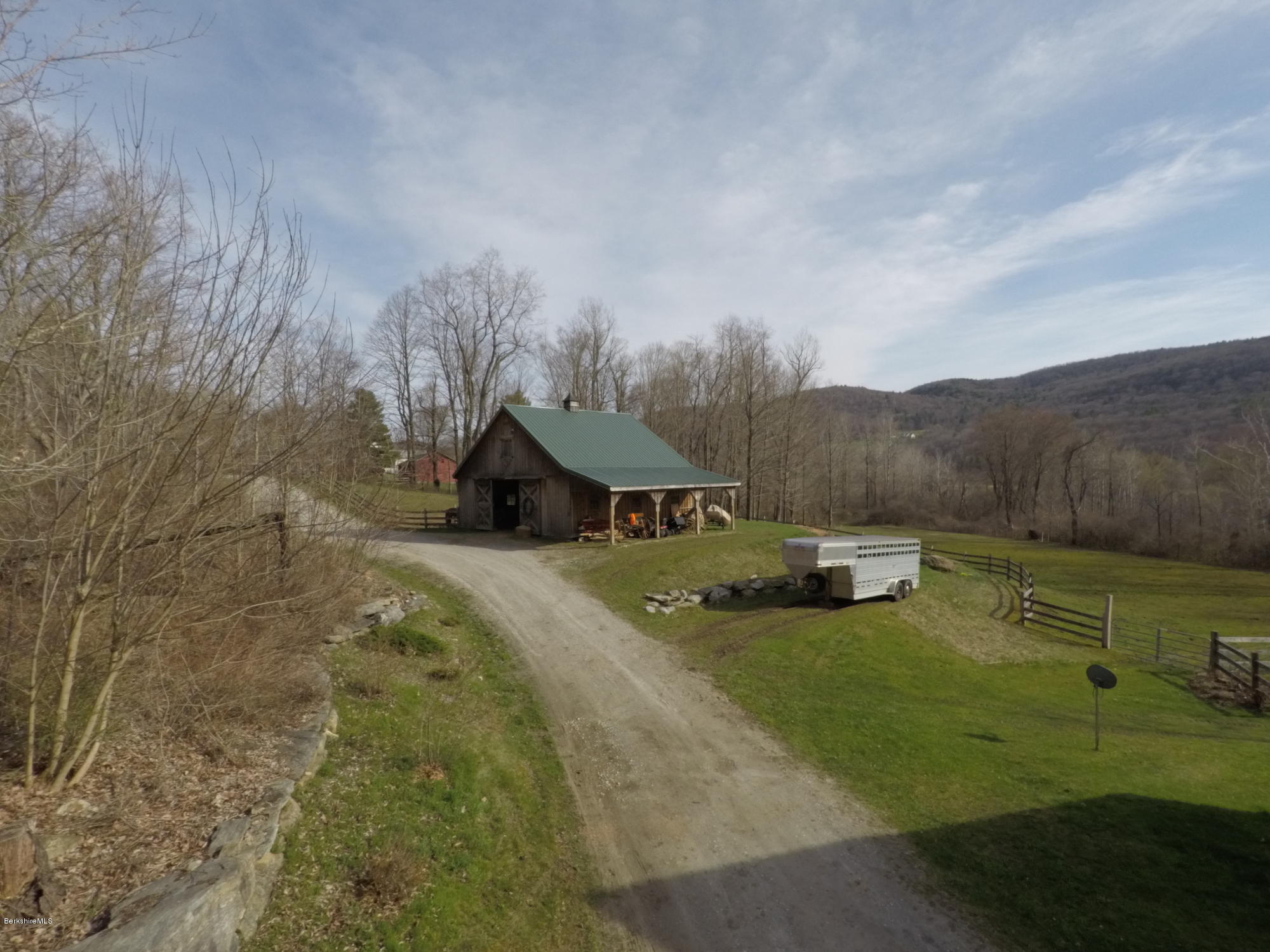 20 Main Road Tyringham, MA 01238 - Photo 4 of 50 a view of a house with yard and mountain