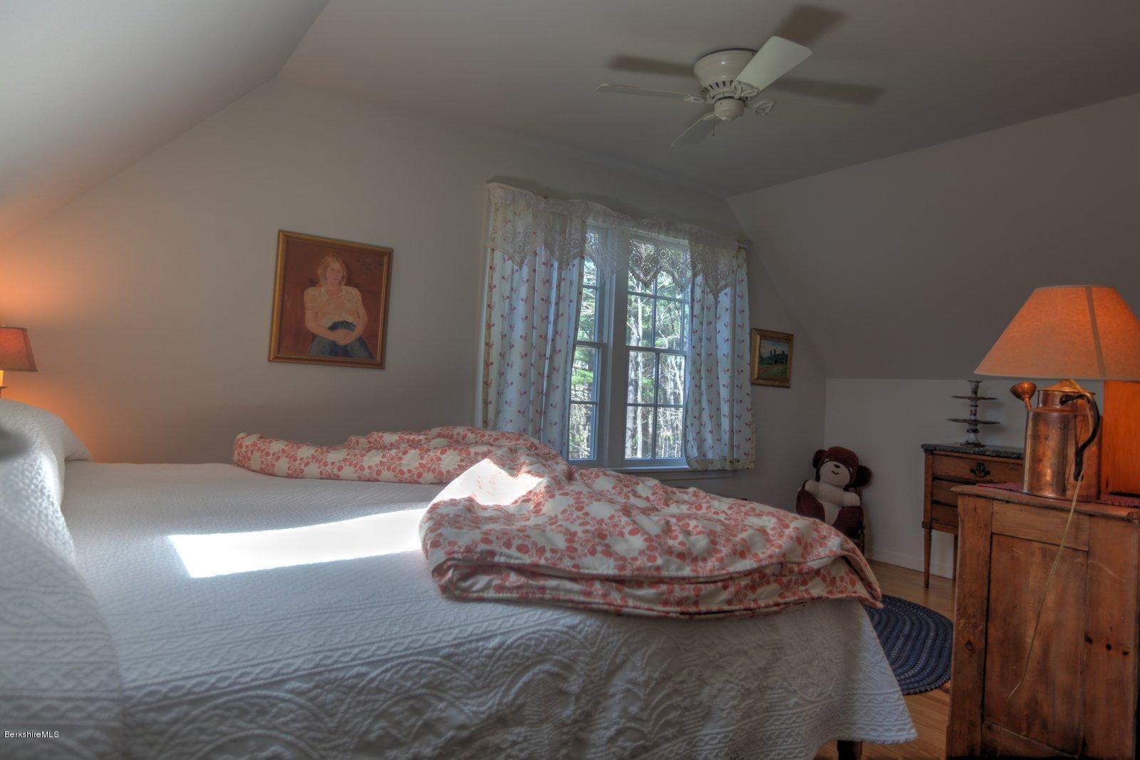 20 Main Road Tyringham, MA 01238 - Photo 32 of 50 a bedroom with bed and window