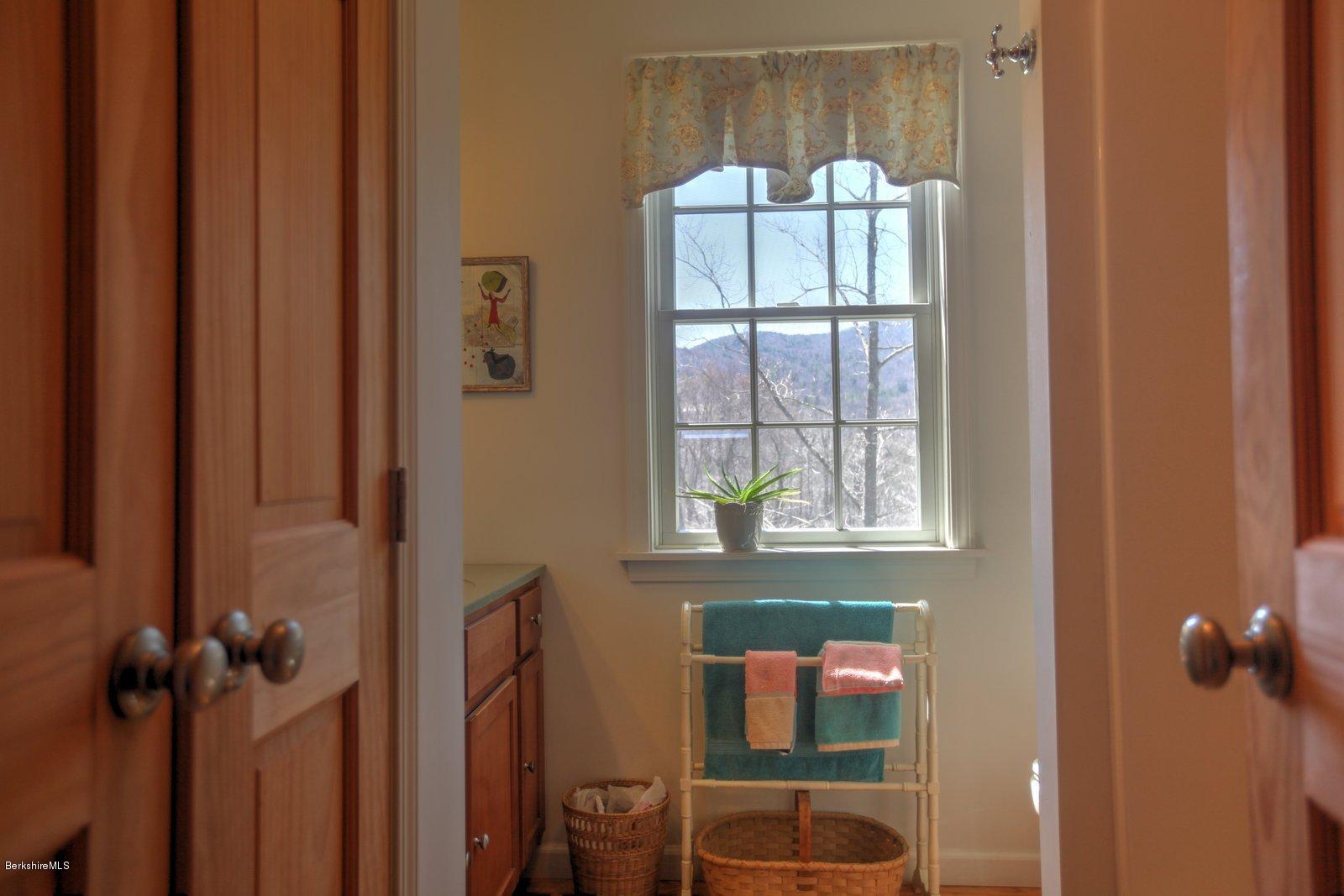 20 Main Road Tyringham, MA 01238 - Photo 34 of 50 a bathroom with a window and a shower