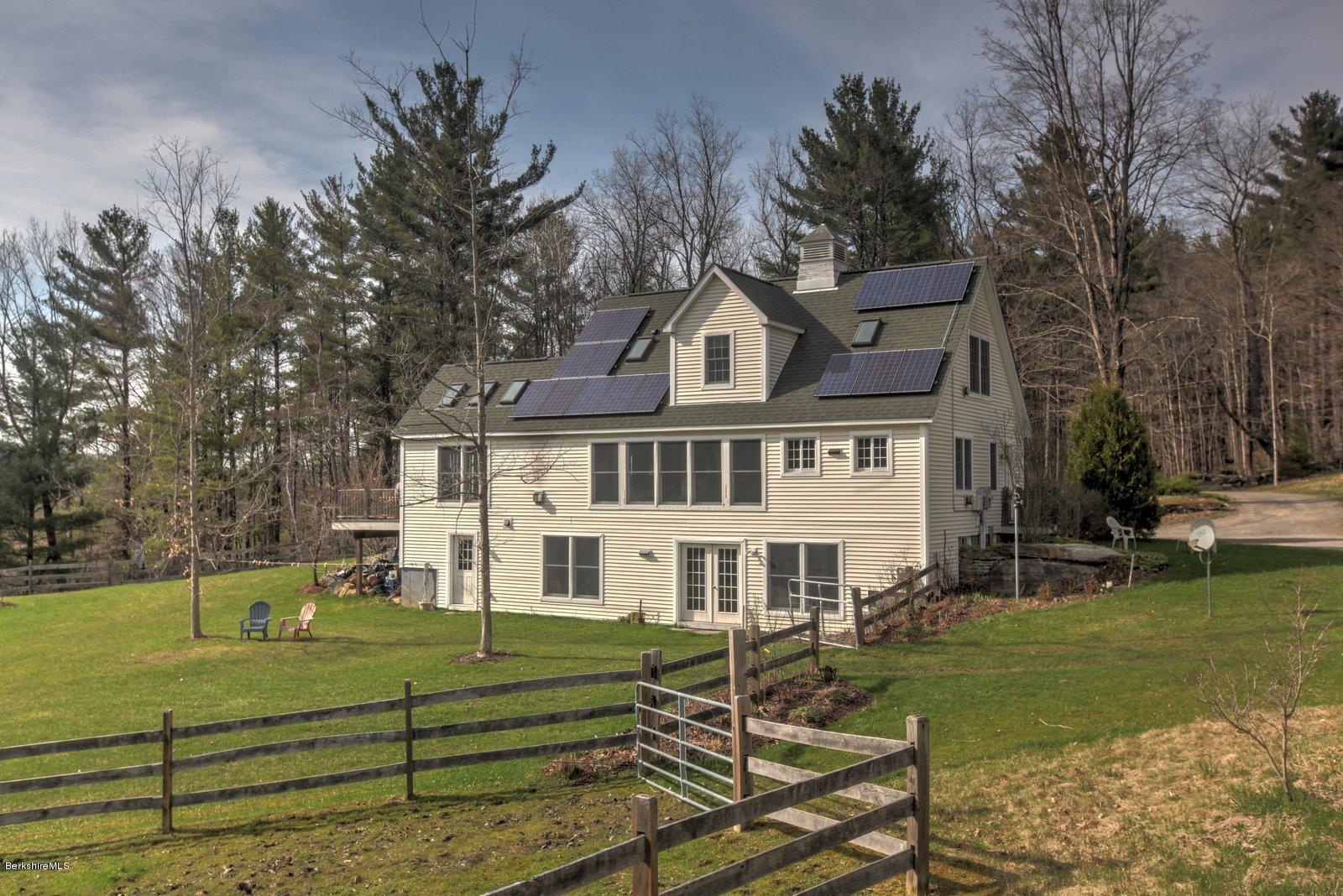 20 Main Road Tyringham, MA 01238 - Photo 45 of 50 a view of a house with a yard