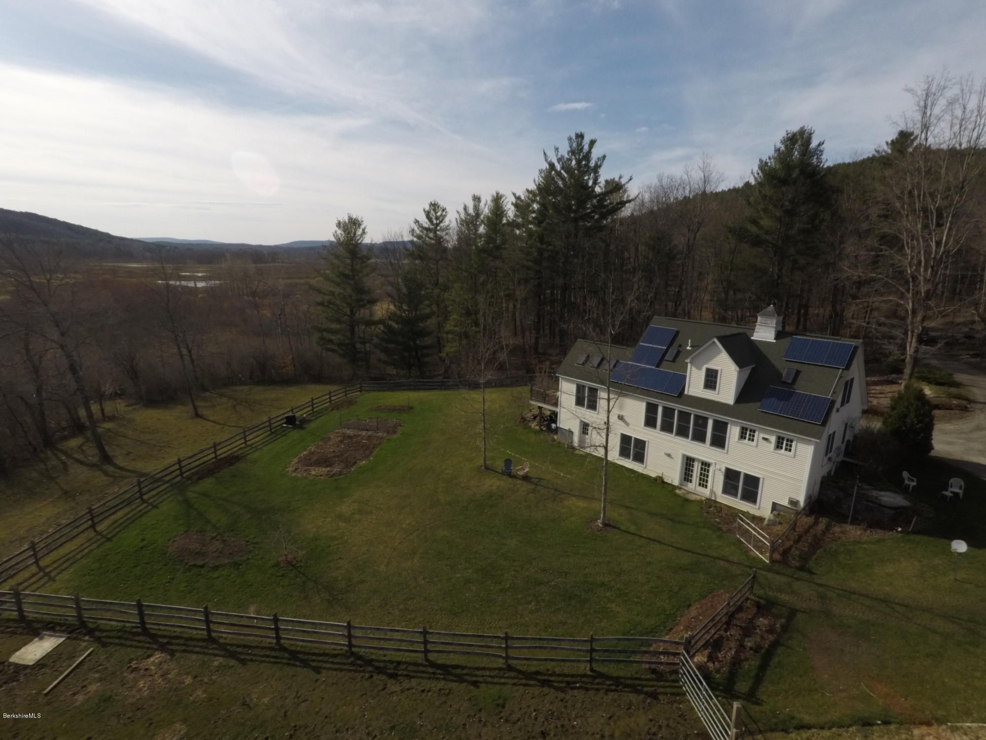 20 Main Road Tyringham, MA 01238 - Photo 8 of 50 a view of multiple houses with a yard