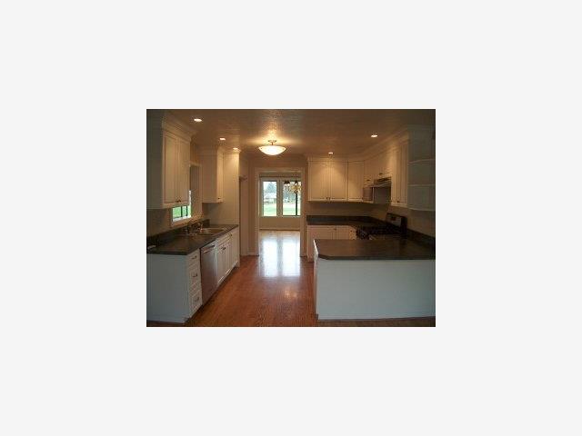 748 Duffin Drive Ridgemark, CA 95023 - Photo 2 of 8 a upper view of a living room with kitchen and sink