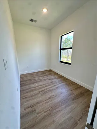 an empty room with a window