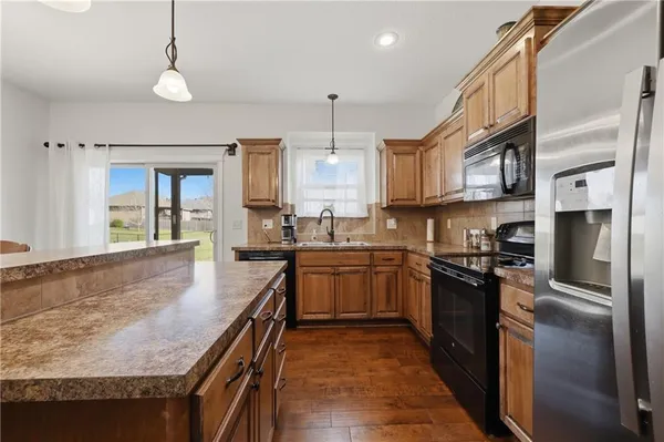 $350,000 | 1611 Northwest Nicholas Drive, Grain Valley, MO 64029