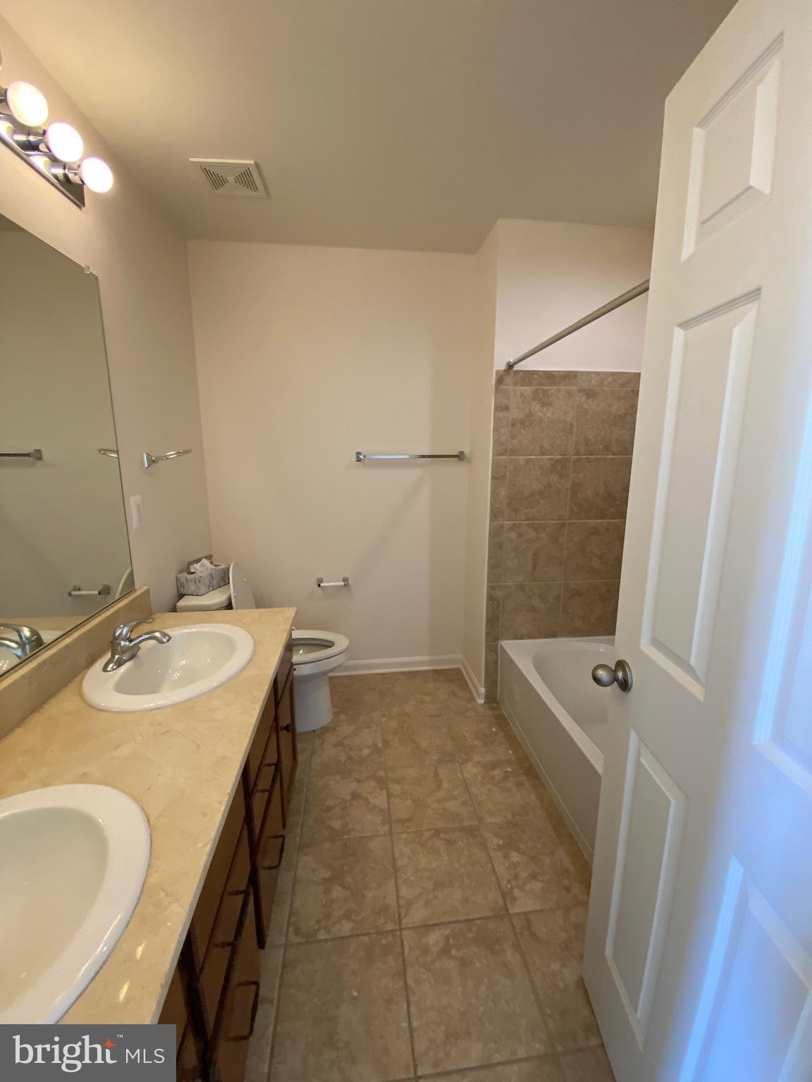 44153 Seawolve Square Chantilly, VA 20152 - Photo 36 of 52 Tub/shower combination in 2nd Full Bathroom