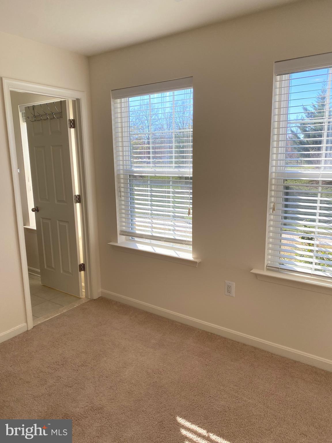 44153 Seawolve Square Chantilly, VA 20152 - Photo 44 of 52 White wood Shades on Windows throughout the home