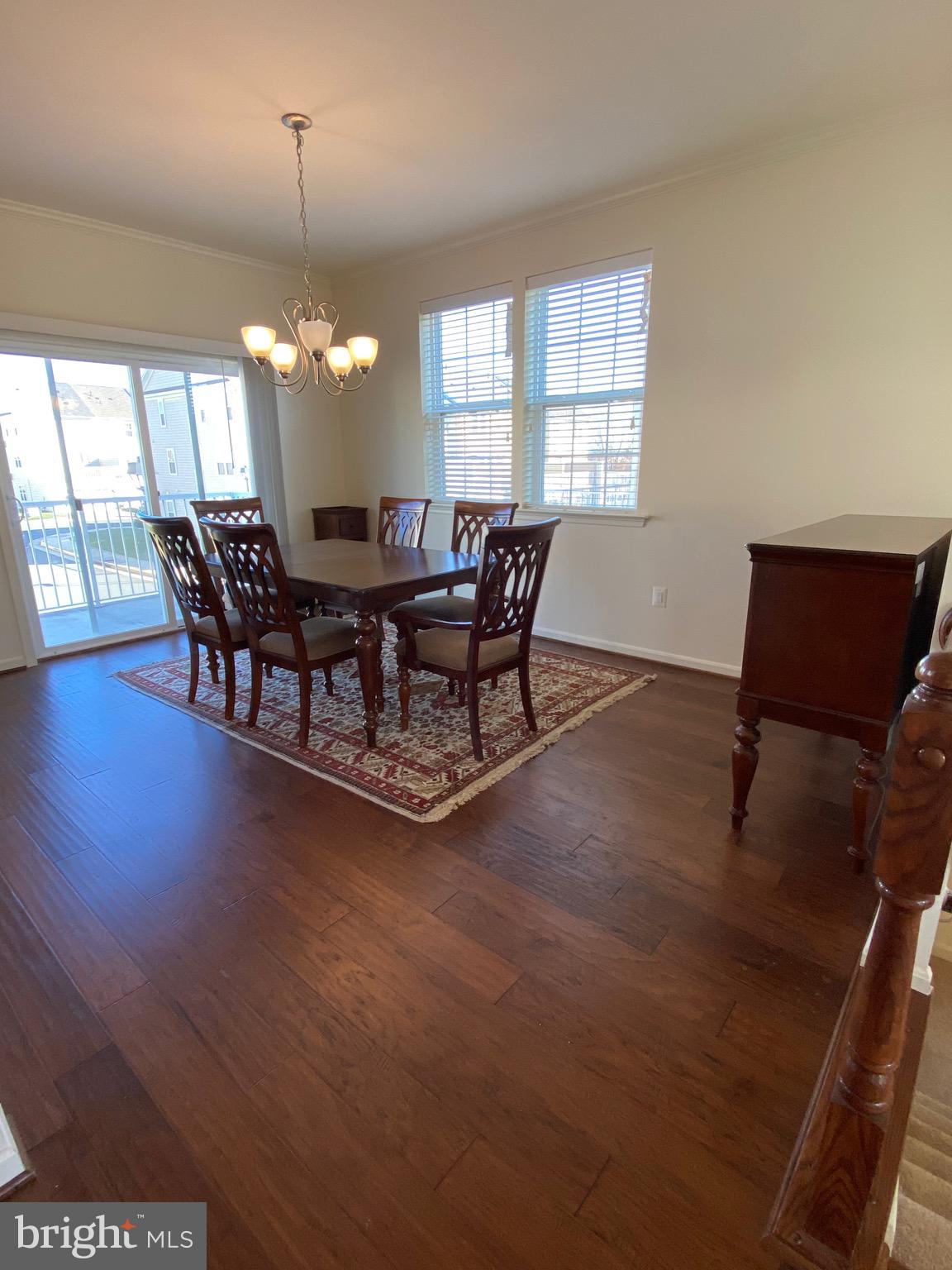 44153 Seawolve Square Chantilly, VA 20152 - Photo 9 of 52 Dining or Family Room with French Doors to Balcony