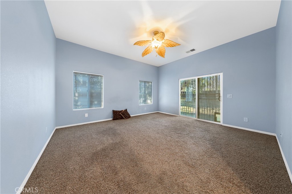 32858 Alderbrook Road Wildomar, CA 92595 - Photo 21 of 56 a view of an empty room with a window