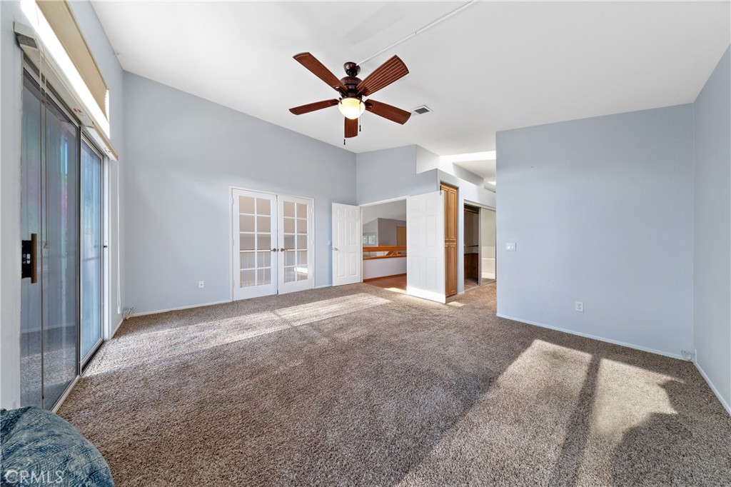 32858 Alderbrook Road Wildomar, CA 92595 - Photo 27 of 56 a view of a livingroom with a ceiling fan and window