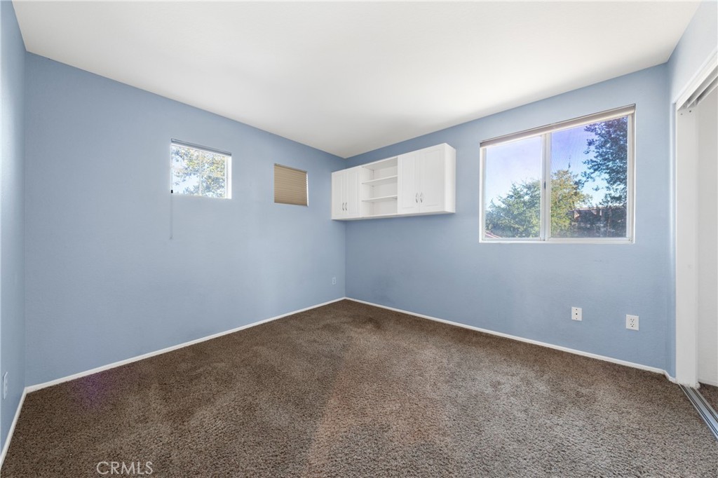 32858 Alderbrook Road Wildomar, CA 92595 - Photo 34 of 56 a view of an empty room with a window
