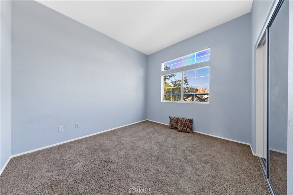 32858 Alderbrook Road Wildomar, CA 92595 - Photo 37 of 56 an empty room with windows and air conditioner vent