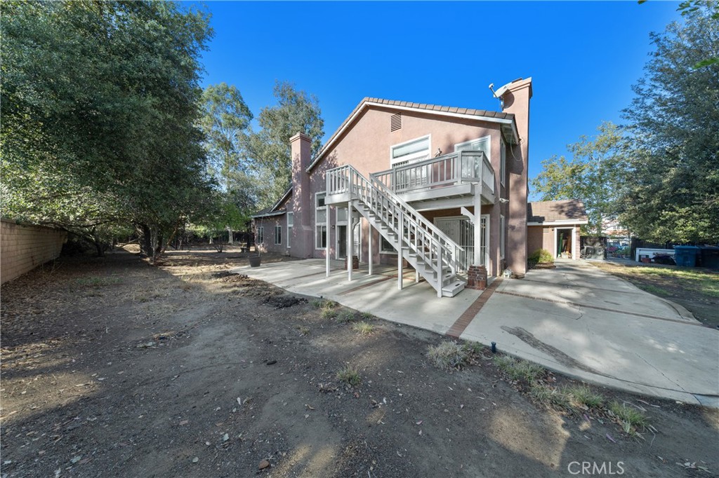 32858 Alderbrook Road Wildomar, CA 92595 - Photo 42 of 56 a view of a house with backyard and trees