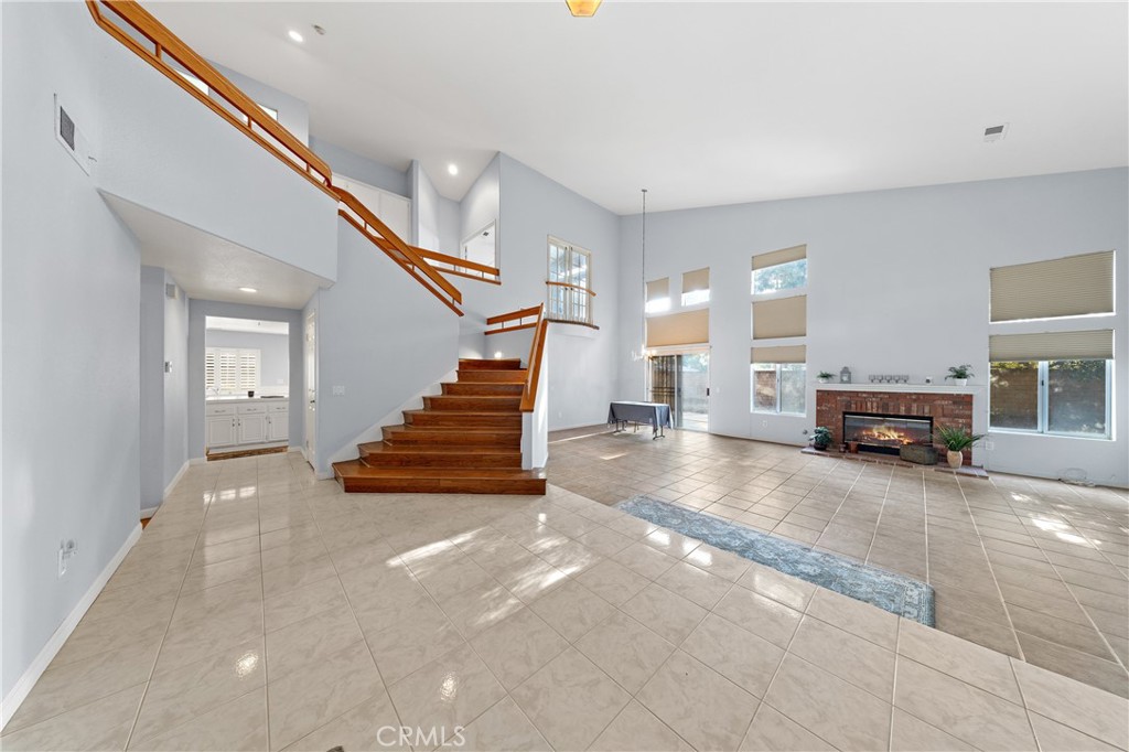 32858 Alderbrook Road Wildomar, CA 92595 - Photo 6 of 56 a view of a livingroom with furniture and stairs