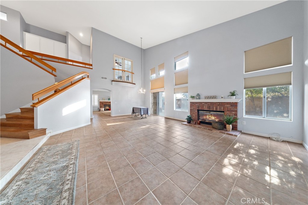 32858 Alderbrook Road Wildomar, CA 92595 - Photo 8 of 56 a view of a livingroom with furniture and a fireplace