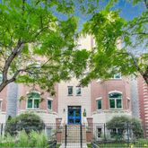 front view of house with a tree