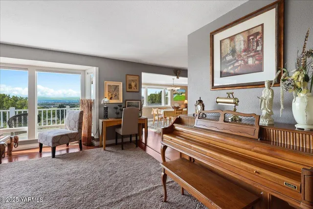 a kitchen with white cabinets and appliances