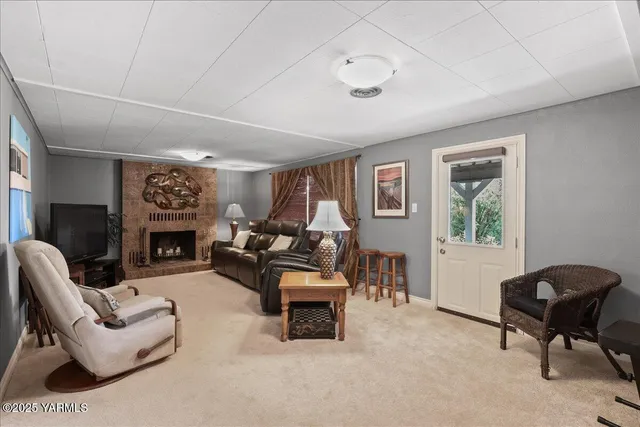 a kitchen with a refrigerator and table