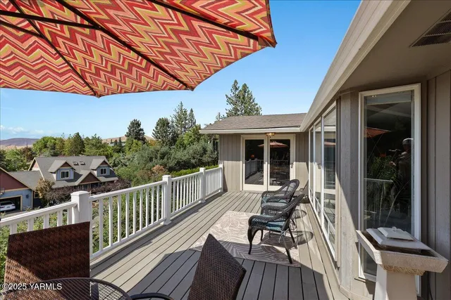 a view of balcony with furniture