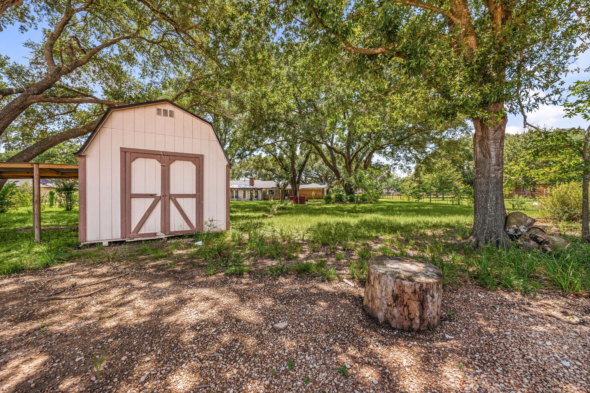 3530 Katy Hockley Road Katy, TX 77493 - Photo 17 of 25 a view of a garden with large trees
