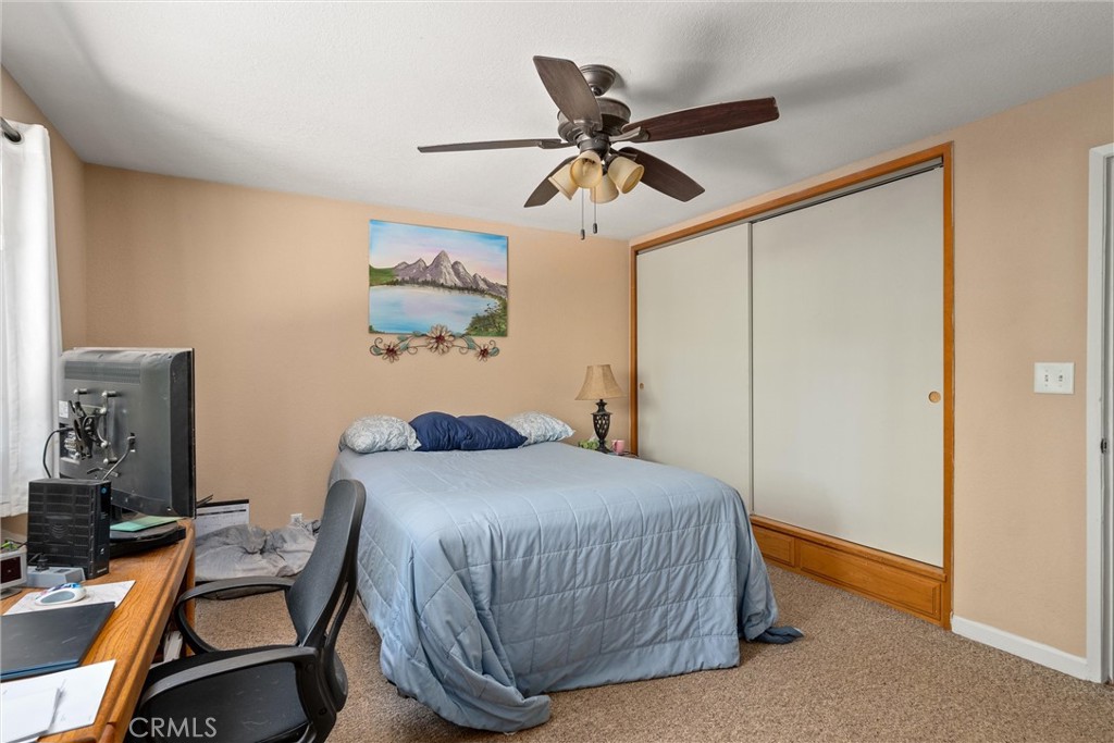 6176 Some Way Magalia, CA 95954 - Photo 20 of 46 a bedroom with a bed and furniture