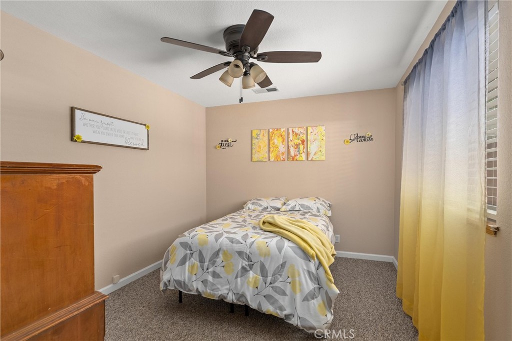 6176 Some Way Magalia, CA 95954 - Photo 26 of 46 a bedroom with bed and a window