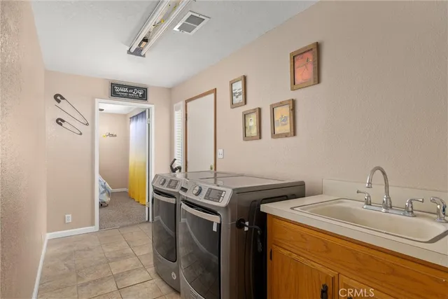 a view of backyard with outdoor seating and green space