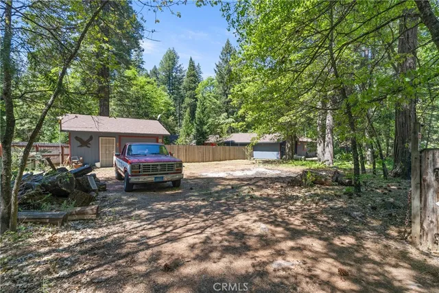a house with trees in the background