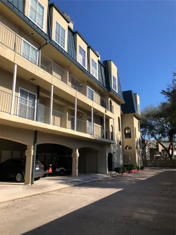 a view of a building with a street