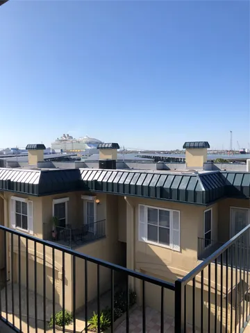 a view of a house with a roof deck