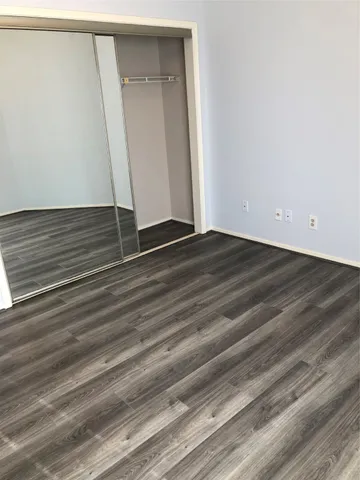 a view of wooden floor with a sink