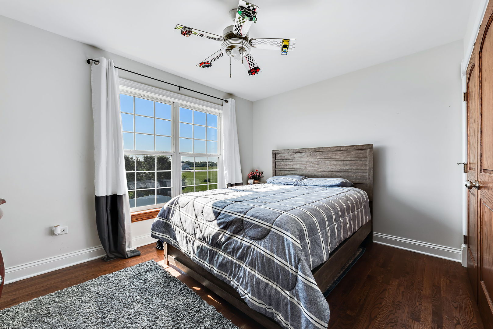 2002 Sandstone Trail Kankakee, IL 60901 - Photo 19 of 27 a bedroom with a bed and a window