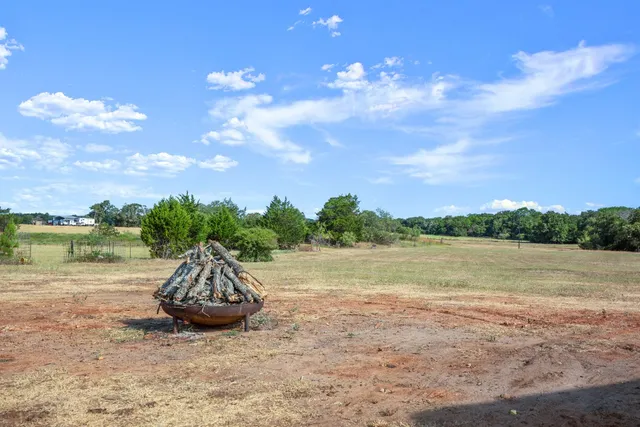 a view of a lake from a yard