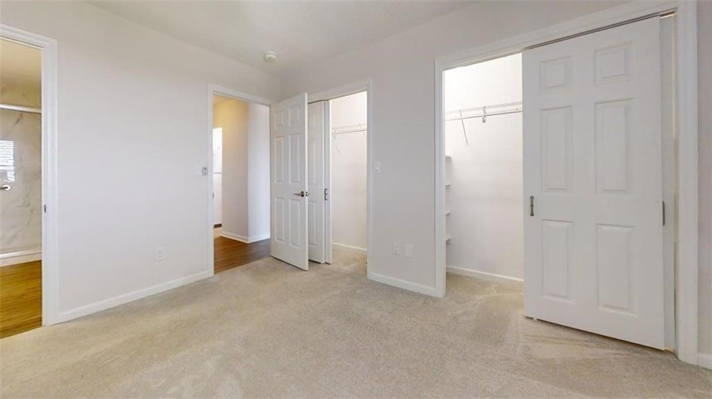 300 Johnson Ferry Road, Unit B805 Sandy Springs, GA 30328 - Photo 29 of 31 an empty room with windows