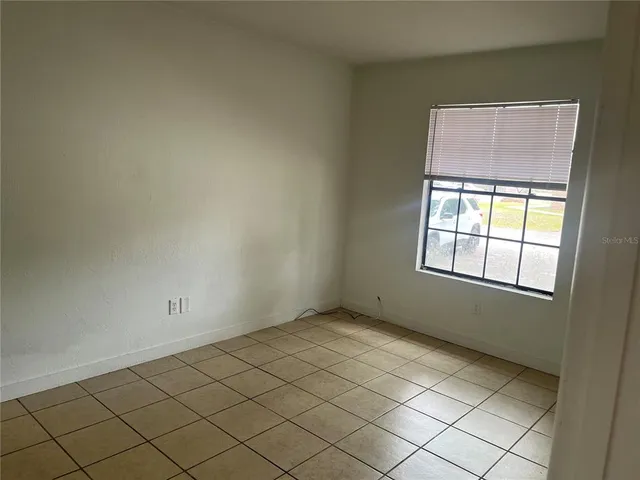 a bathroom with a shower and a toilet