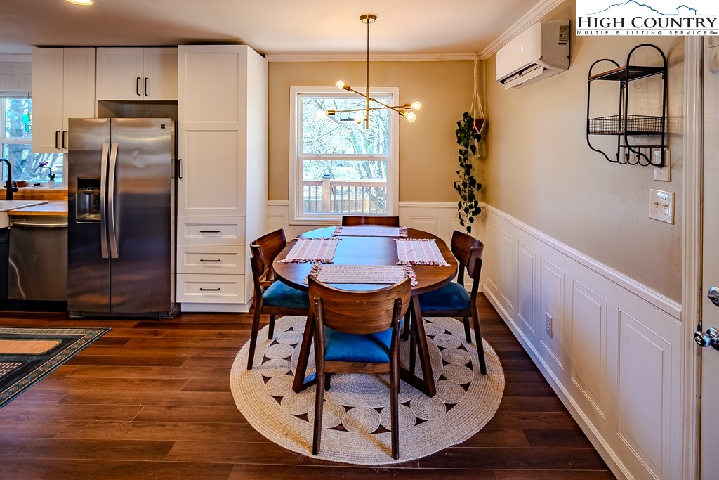 477 Hardaman Circle Boone, NC 28607 - Photo 12 of 48 a view of a livingroom with furniture window and wooden floor