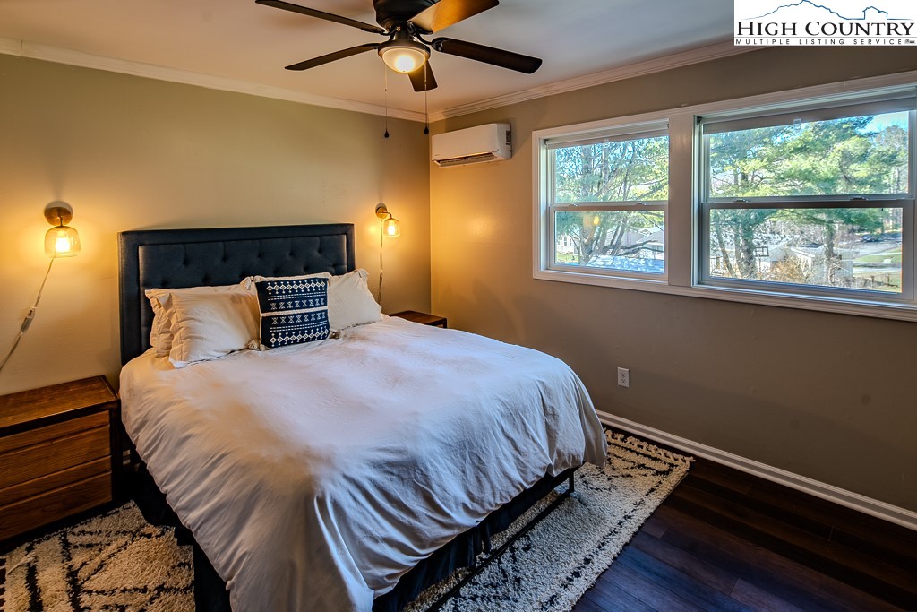477 Hardaman Circle Boone, NC 28607 - Photo 21 of 48 a bedroom with a bed and window